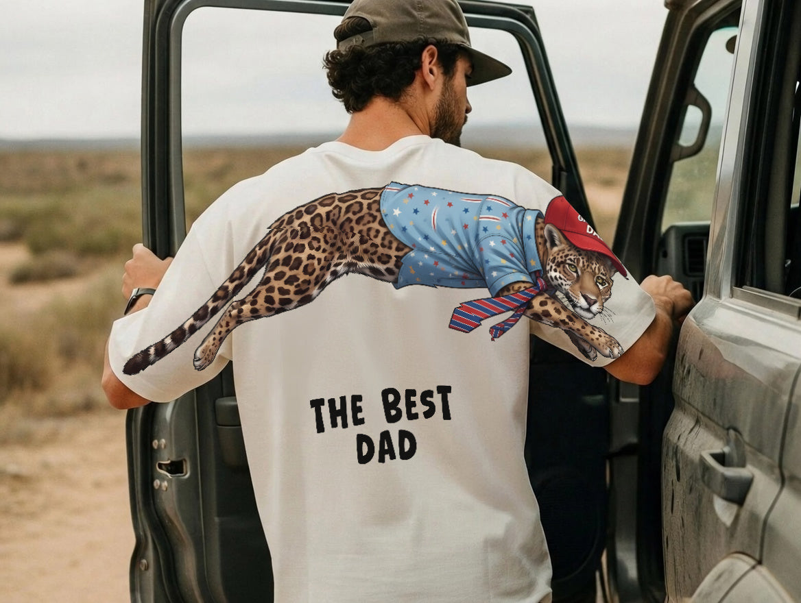 Worlds Greatest Dad jaguar graphic tee funny fathers day by Dripvity, unisex oversized white t-shirt with leaping jaguar wearing cap design
