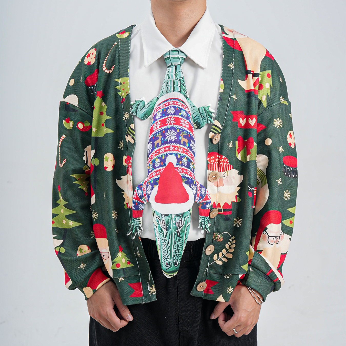 Novelty Christmas tie featuring an alligator wearing a Santa hat and holiday sweater, fun animal-themed festive accessory.