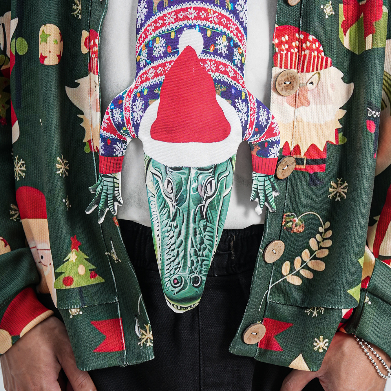 Novelty Christmas tie featuring an alligator wearing a Santa hat and holiday sweater, fun animal-themed festive accessory.