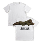 Bear Beary Tired But I Made It graduation graphic tee by Dripvity, unisex oversized white t-shirt with leaping bear in graduation cap and gown
