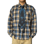 Novelty necktie featuring a realistic hanging black panther design, a sleek and unique fashion accessory.