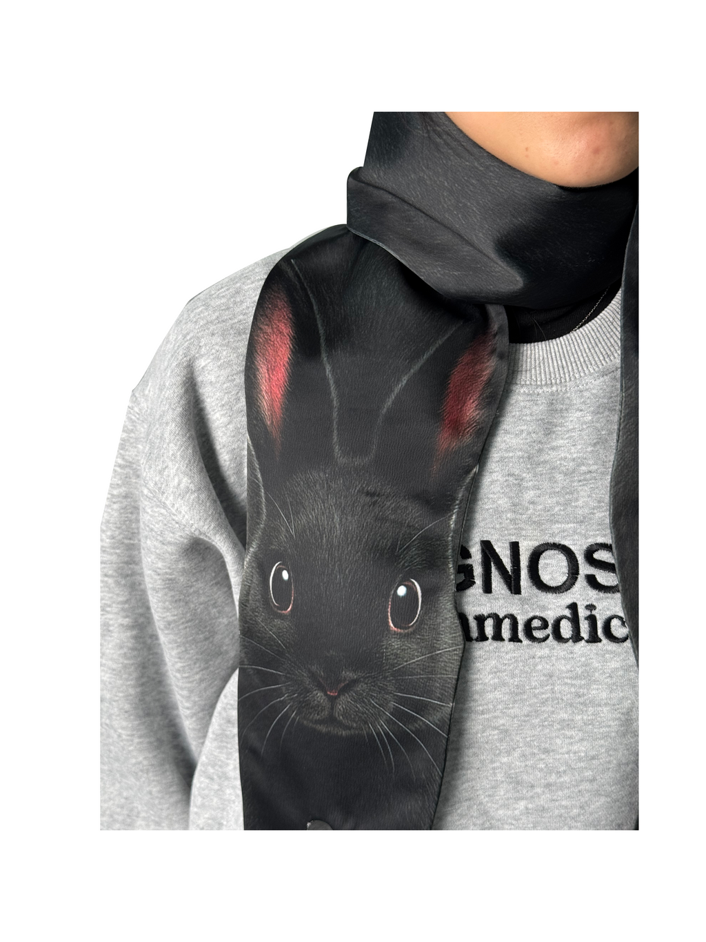 Unique novelty scarf featuring a realistic black rabbit design, a creative and playful fashion accessory.