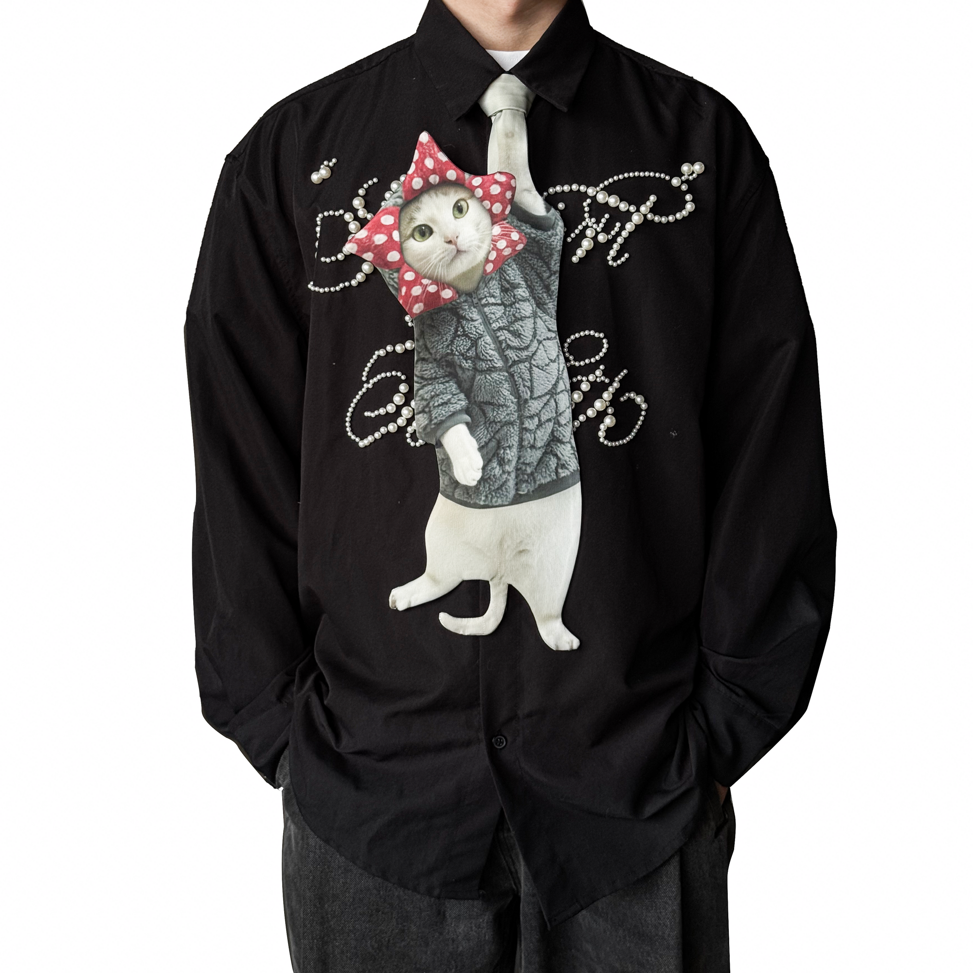 Novelty necktie featuring a realistic design of a cat wearing a grey fleece jacket and a red-and-white polka dot hood, a fun and unique fashion accessory.