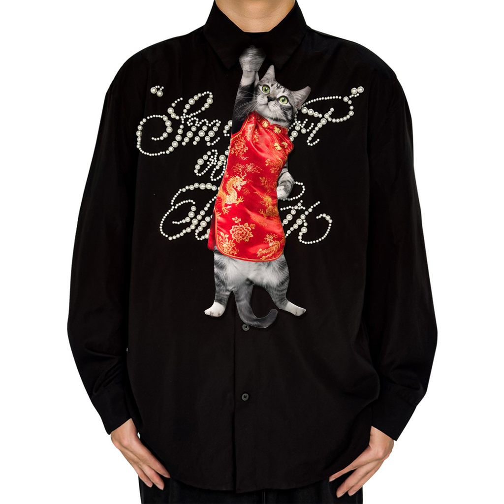 "Novelty necktie featuring a realistic hanging grey cat wearing a traditional red Tang suit with golden dragon and floral embroidery, a unique and festive fashion accessory.