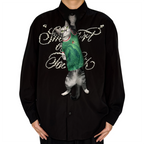 Novelty necktie featuring a realistic hanging grey cat wearing a green jersey with detailed graphic prints, a unique and playful fashion accessory.