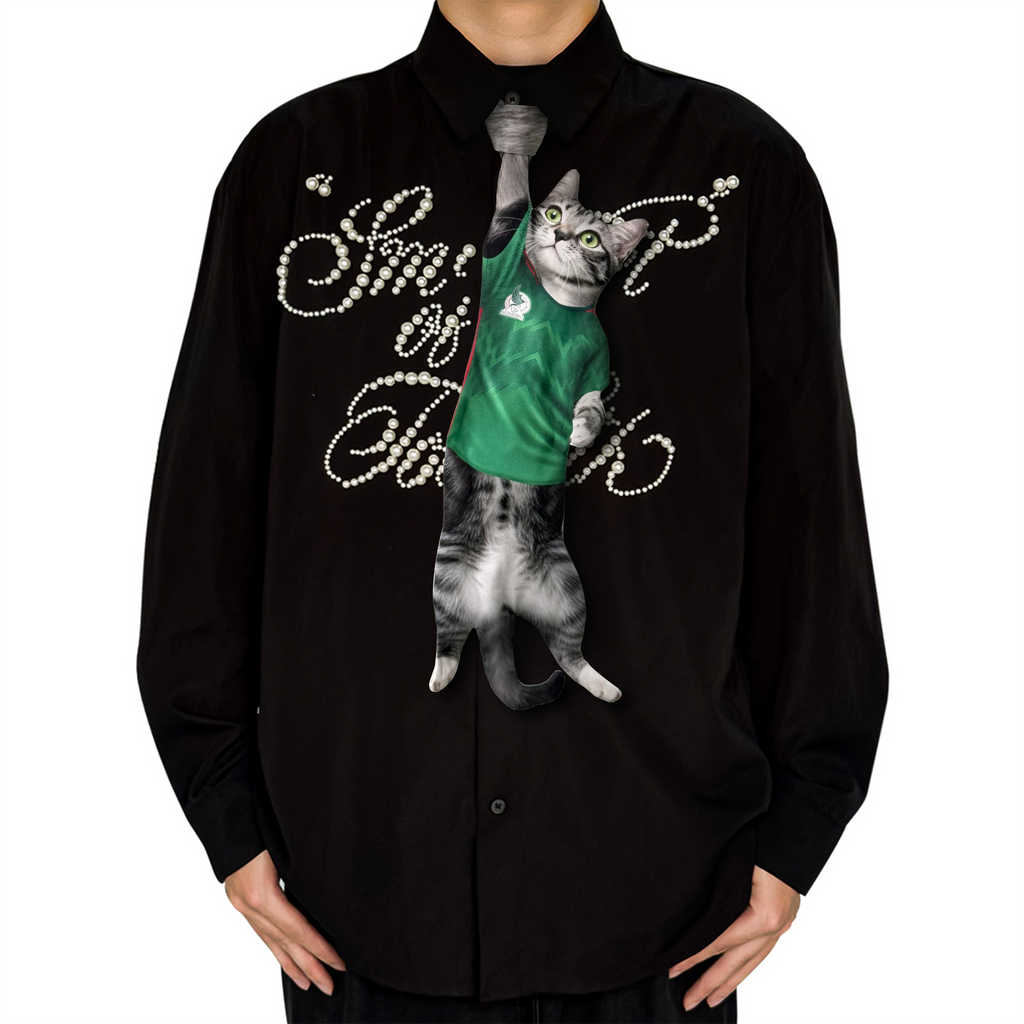 Novelty necktie featuring a realistic hanging grey cat wearing a green soccer jersey, a unique and playful fashion accessory for sports and pet lovers.