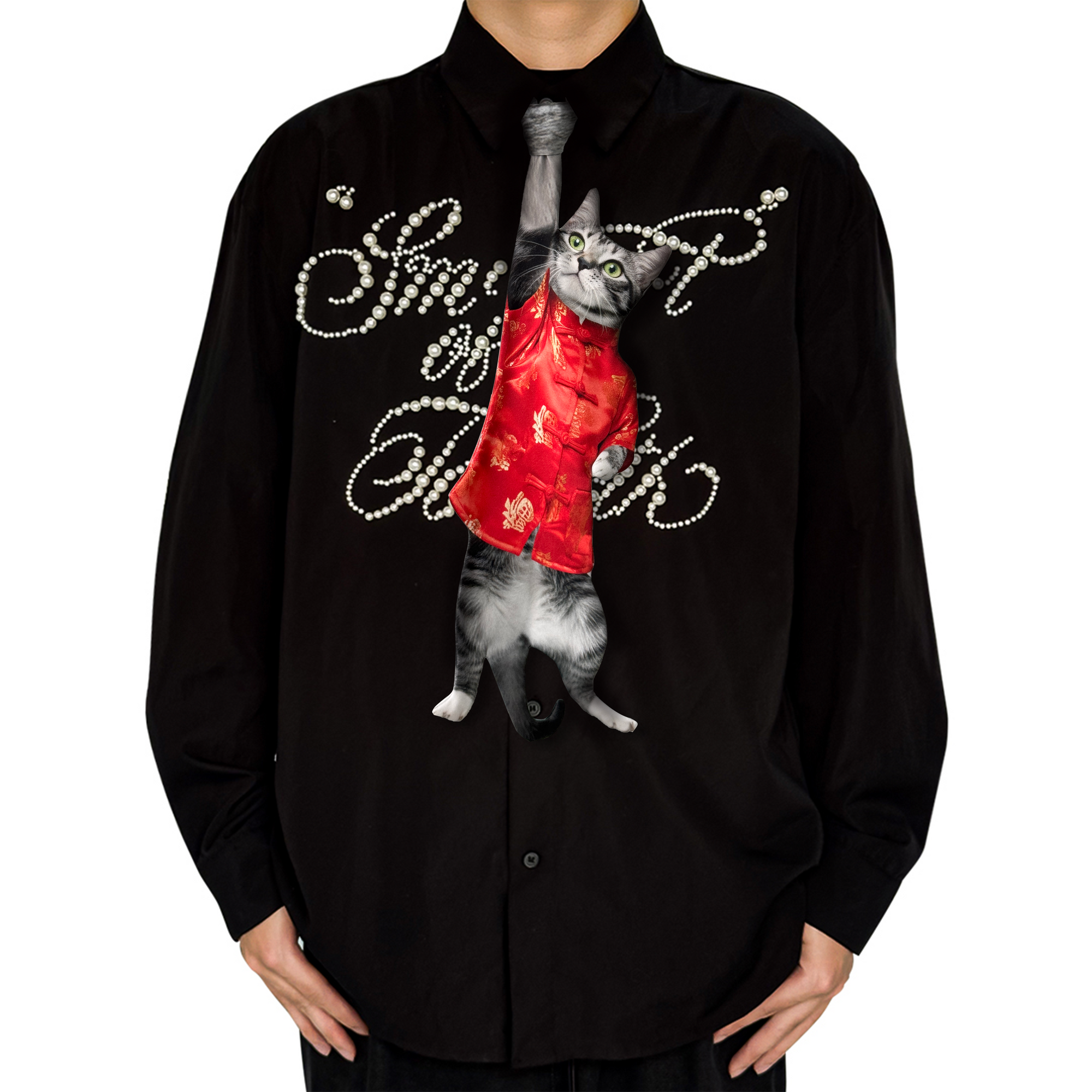 Novelty necktie featuring a realistic hanging grey cat wearing a festive red traditional-style top with gold patterns, a unique and eye-catching fashion accessory.
