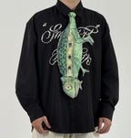 Unique chameleon-shaped novelty tie, a creative and artistic fashion accessory for standout outfits.