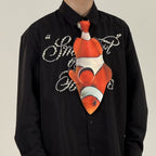 Fun clownfish-shaped novelty tie, a unique and colorful fashion accessory for ocean lovers and creative outfits.