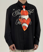 Fun clownfish-shaped novelty tie, a unique and colorful fashion accessory for ocean lovers and creative outfits.