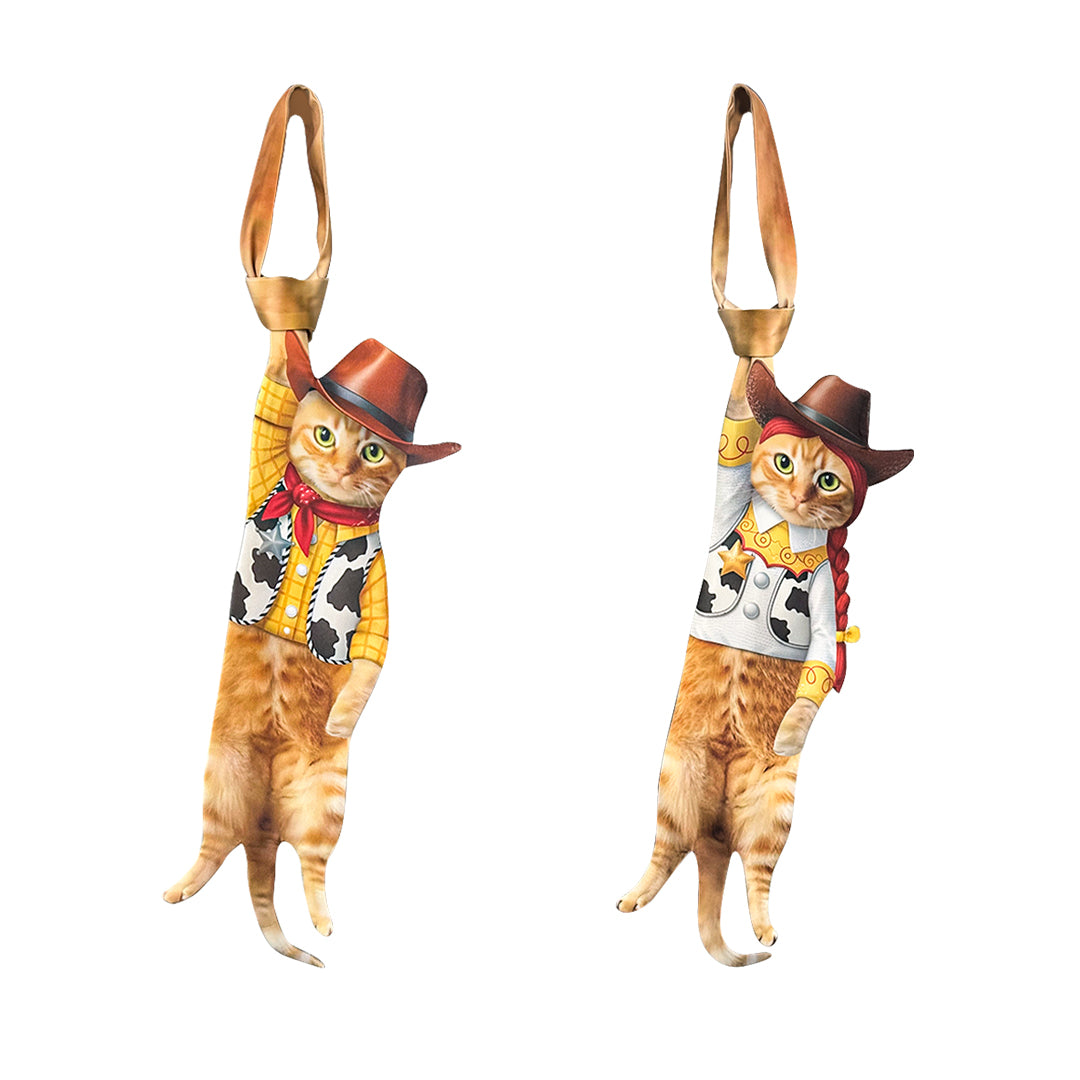 Novelty necktie featuring a realistic hanging orange tabby cat dressed in Western-style cowboy and cowgirl outfits, a playful and unique fashion accessory.