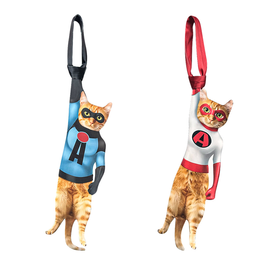 Novelty necktie featuring a realistic hanging orange tabby cat dressed in blue and white superhero costumes, a fun and unique fashion accessory.
