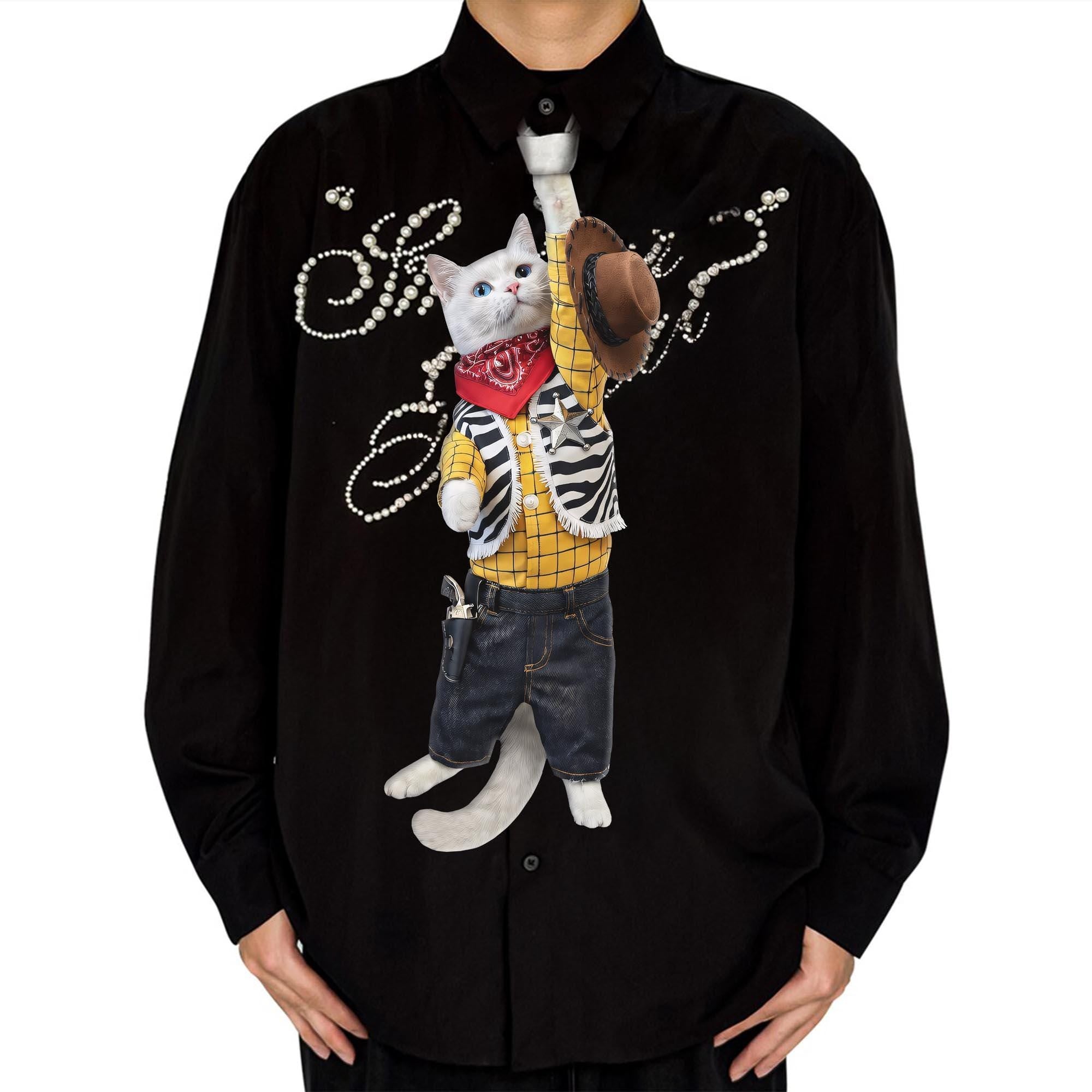 "Novelty necktie featuring a white cat dressed as a cowboy, wearing a yellow plaid shirt, vest, jeans, bandana, and holding a hat