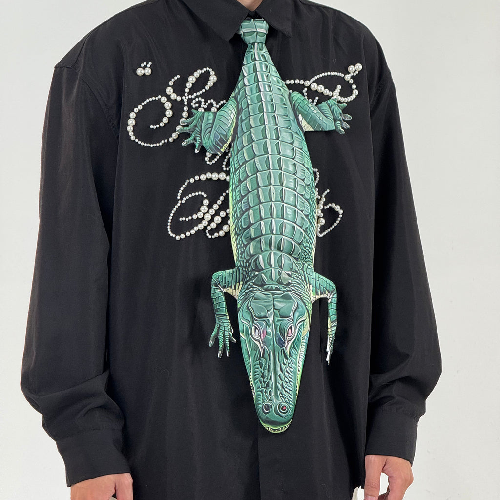 Unique crocodile-shaped novelty tie, a bold fashion accessory for those who love creative and eye-catching designs.