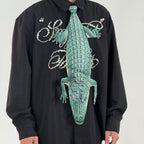 Unique crocodile-shaped novelty tie, a bold fashion accessory for those who love creative and eye-catching designs.