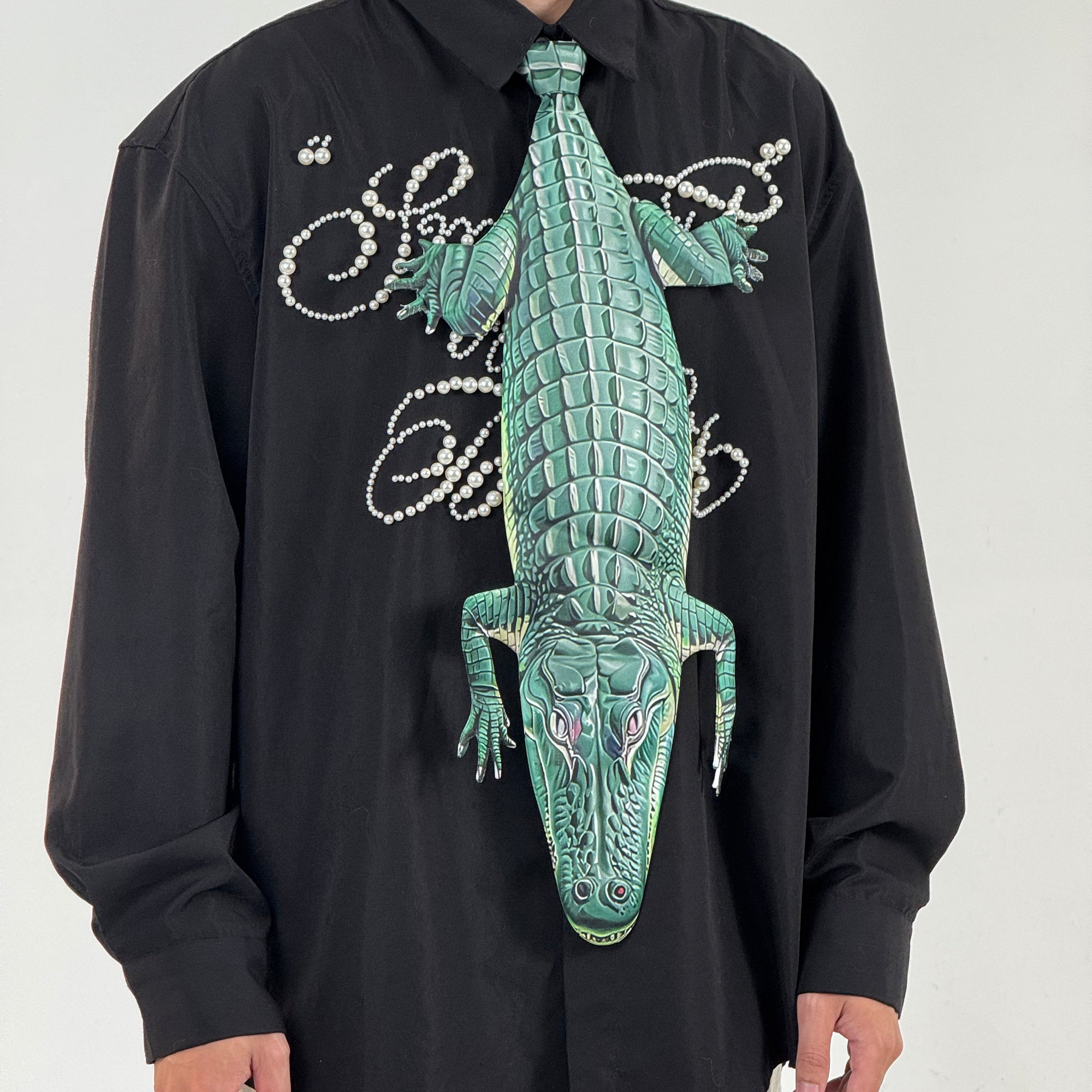 Unique crocodile-shaped novelty tie, a bold fashion accessory for those who love creative and eye-catching designs.