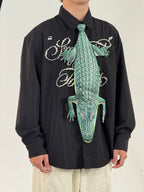 Unique crocodile-shaped novelty tie, a bold fashion accessory for those who love creative and eye-catching designs.
