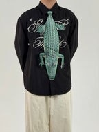 Unique crocodile-shaped novelty tie, a bold fashion accessory for those who love creative and eye-catching designs.