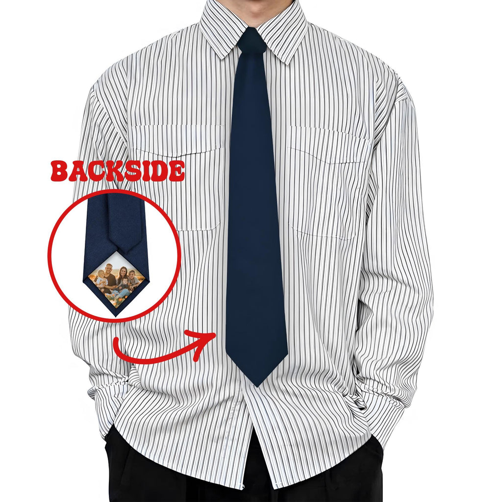 A set of one red and one black necktie, each featuring a custom-printed family photograph at the bottom tip, presented as a personalized gift option.
