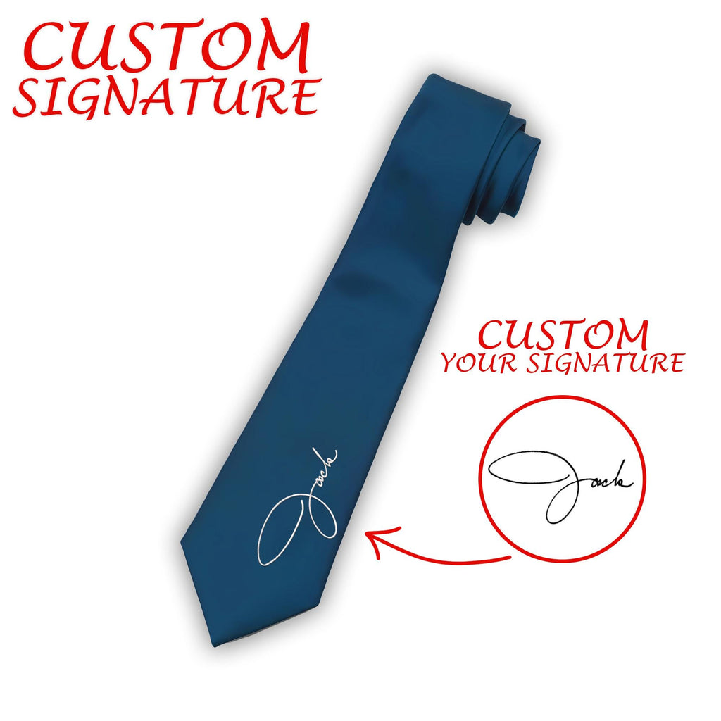 A dark blue custom necktie featuring a personalized signature embroidered in white, designed as a custom gift.