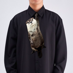 Novelty necktie featuring a realistic hanging river otter design, a fun and unique fashion accessory.