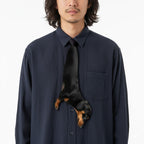 Novelty necktie featuring a realistic black and tan Dachshund dog design, a playful and unique fashion accessory.