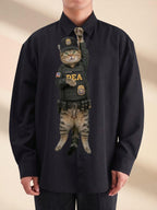 Novelty necktie featuring a tabby cat dressed as a DEA agent, wearing a tactical vest with 'DEA' lettering, a badge, and a matching cap