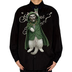 Novelty necktie featuring a white cat dressed as the supervillain Doctor Doom, wearing a signature metallic mask, green cloak, and suit jacket