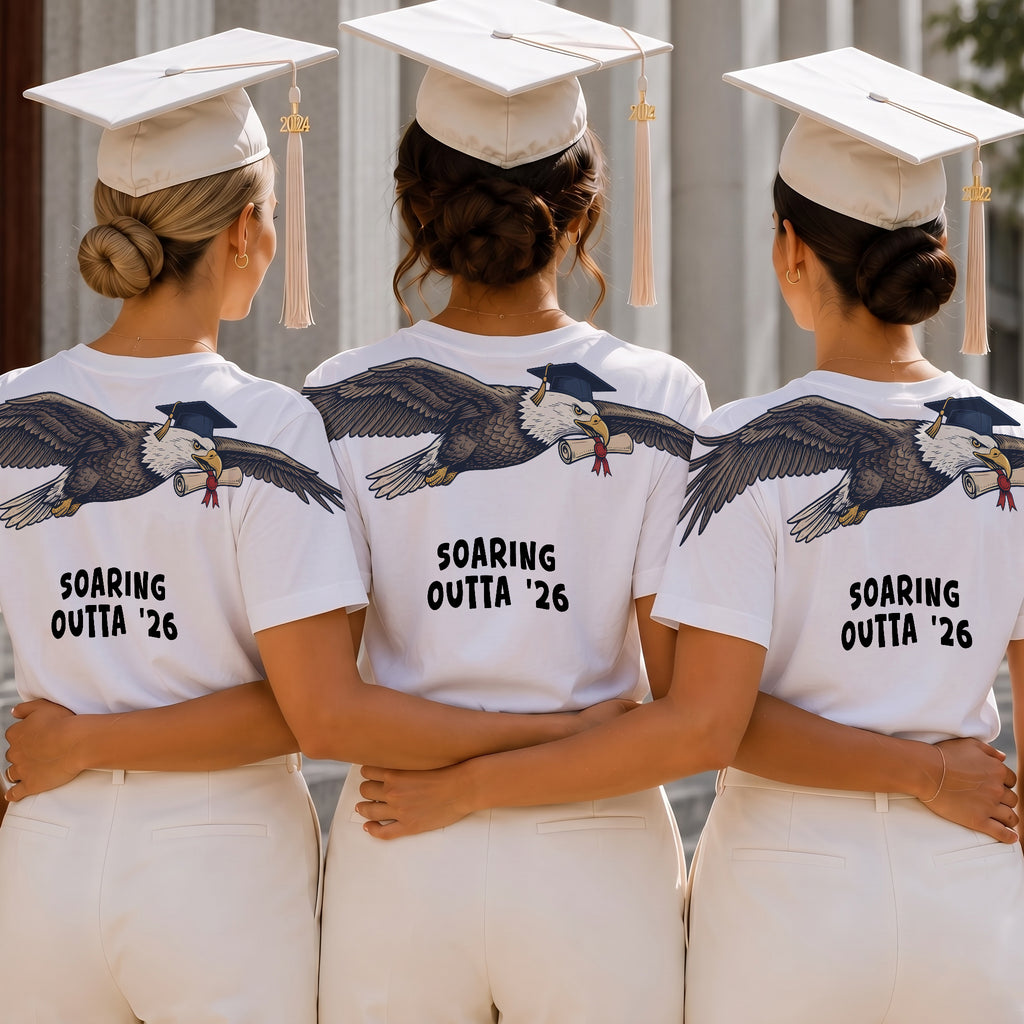 Eagle Soaring Outta 26 graduation graphic tee by Dripvity, unisex oversized white t-shirt with flying bald eagle in graduation cap and diploma