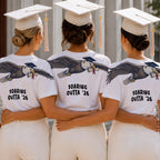 Eagle Soaring Outta 26 graduation graphic tee by Dripvity, unisex oversized white t-shirt with flying bald eagle in graduation cap and diploma