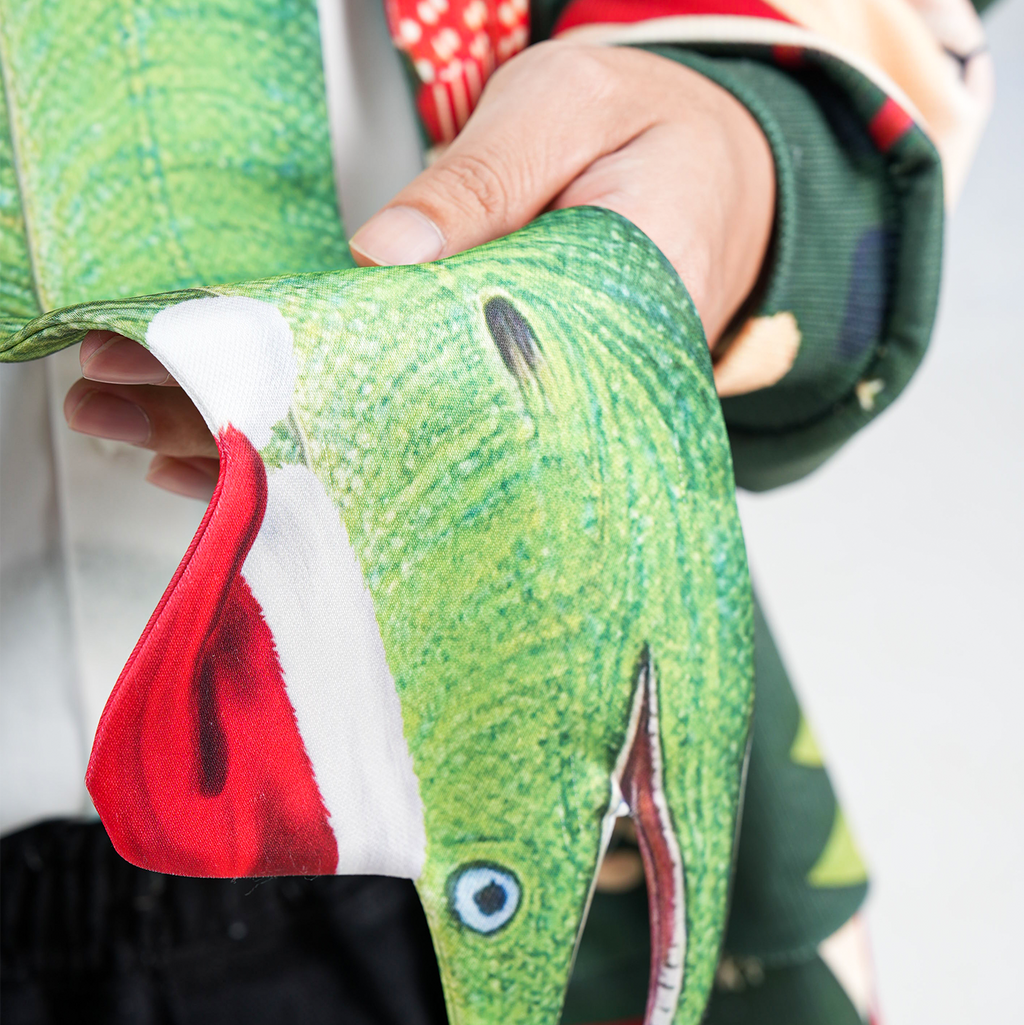 Unique eel-shaped novelty tie, creative animal-themed accessory for parties and festive events.