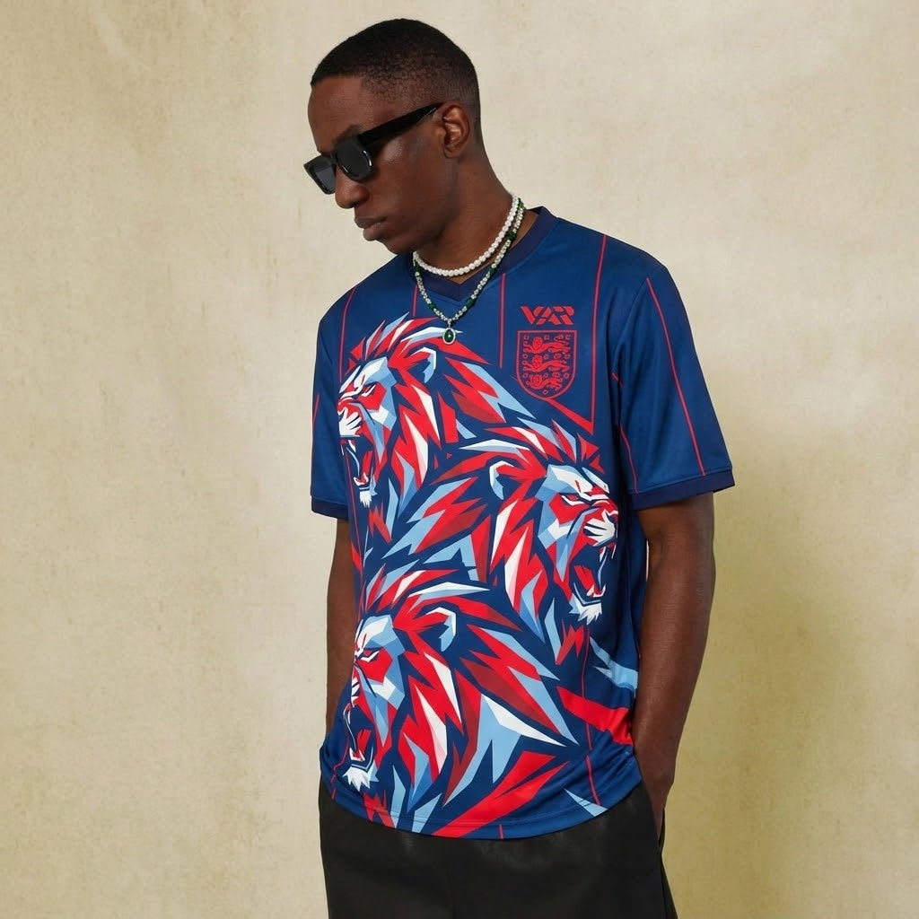 England roaring lion graphic jersey blue by Dripvity, unisex oversized streetwear t-shirt with fierce lion design and England crest
