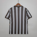 England Three Lions striped football jersey graphic tee by Dripvity, unisex oversized black and white streetwear t-shirt with iconic England crest