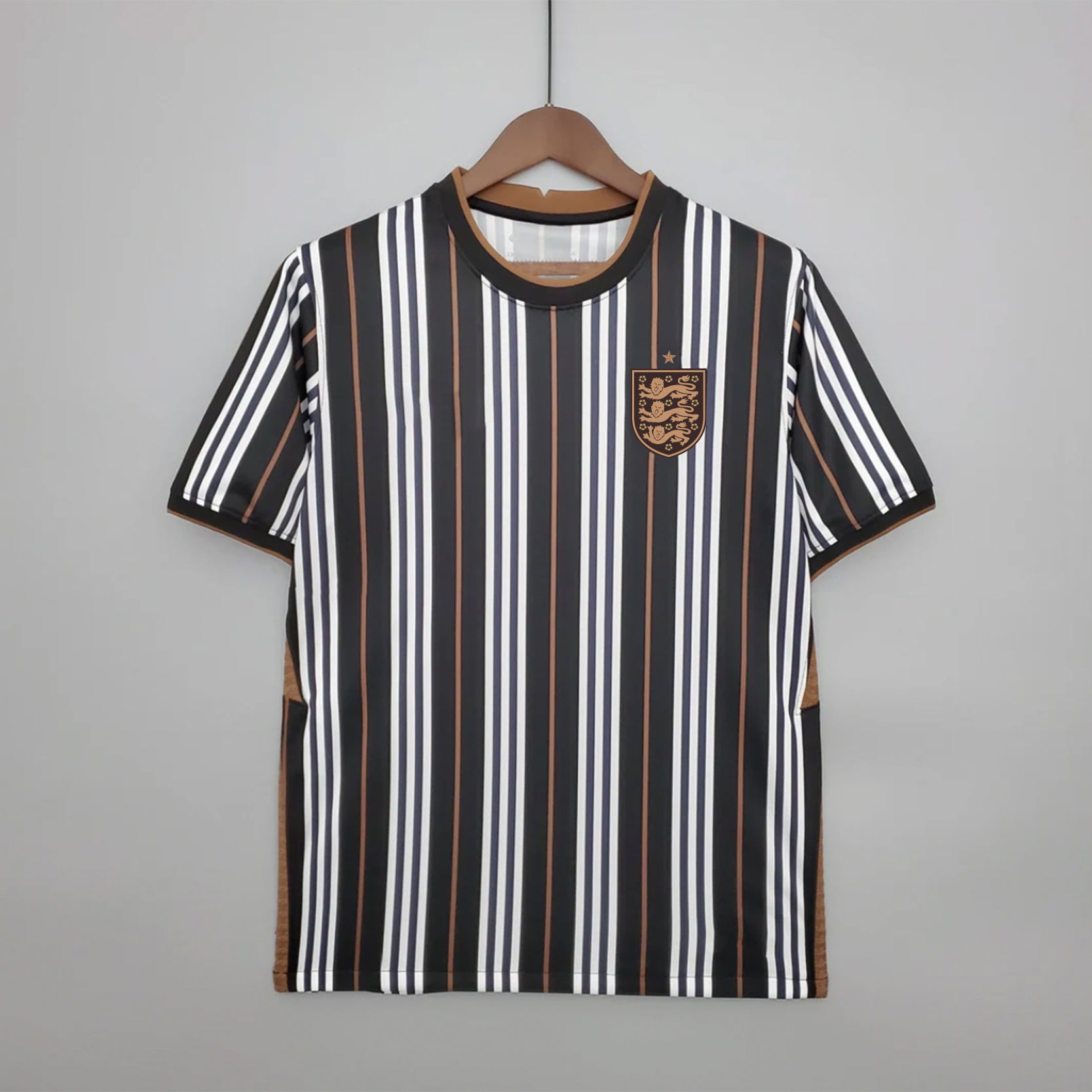 England Three Lions striped football jersey graphic tee by Dripvity, unisex oversized black and white streetwear t-shirt with iconic England crest