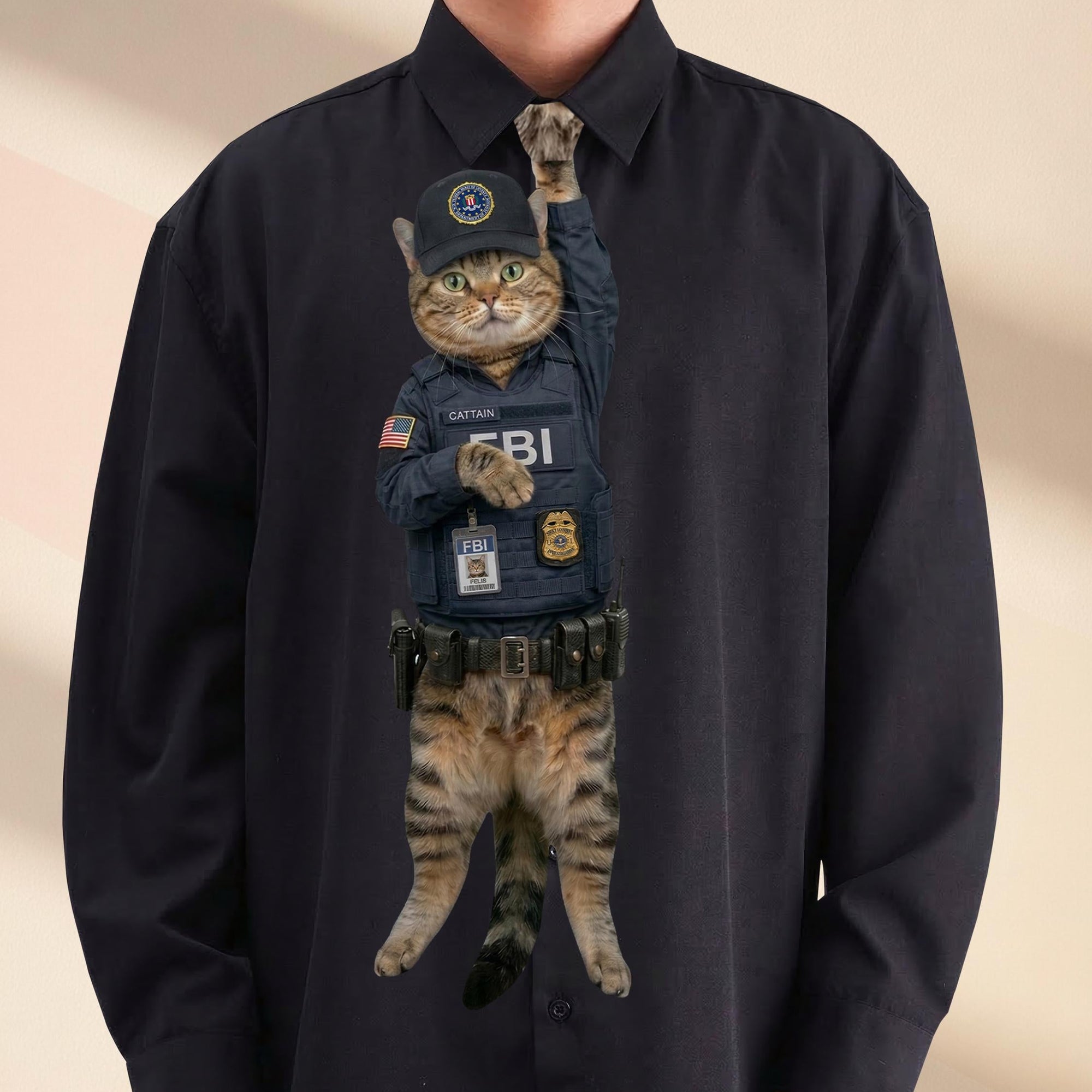 Novelty necktie featuring a tabby cat dressed as an FBI agent, wearing a tactical vest, badge, and an FBI cap