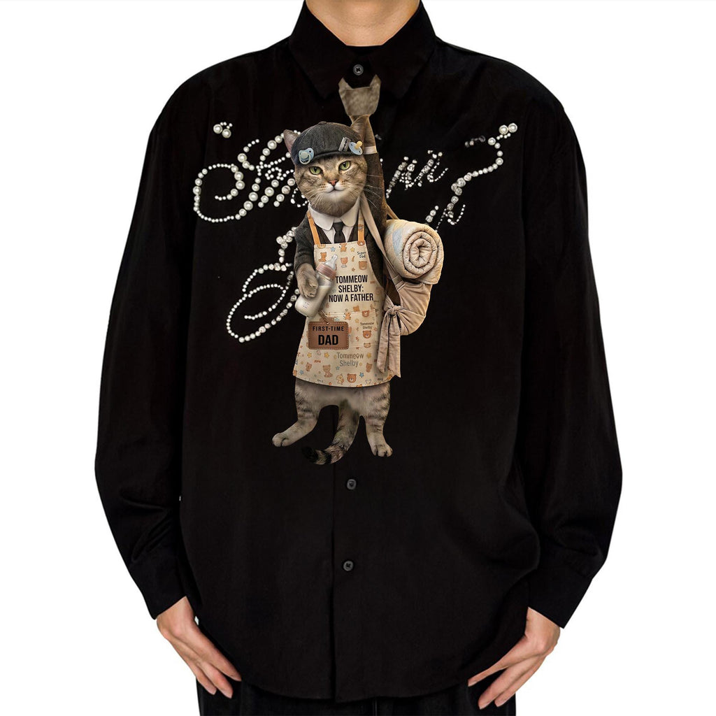 Novelty necktie featuring a tabby cat dressed as a first-time father, wearing an apron with a baby bottle and carrying a rolled blanket