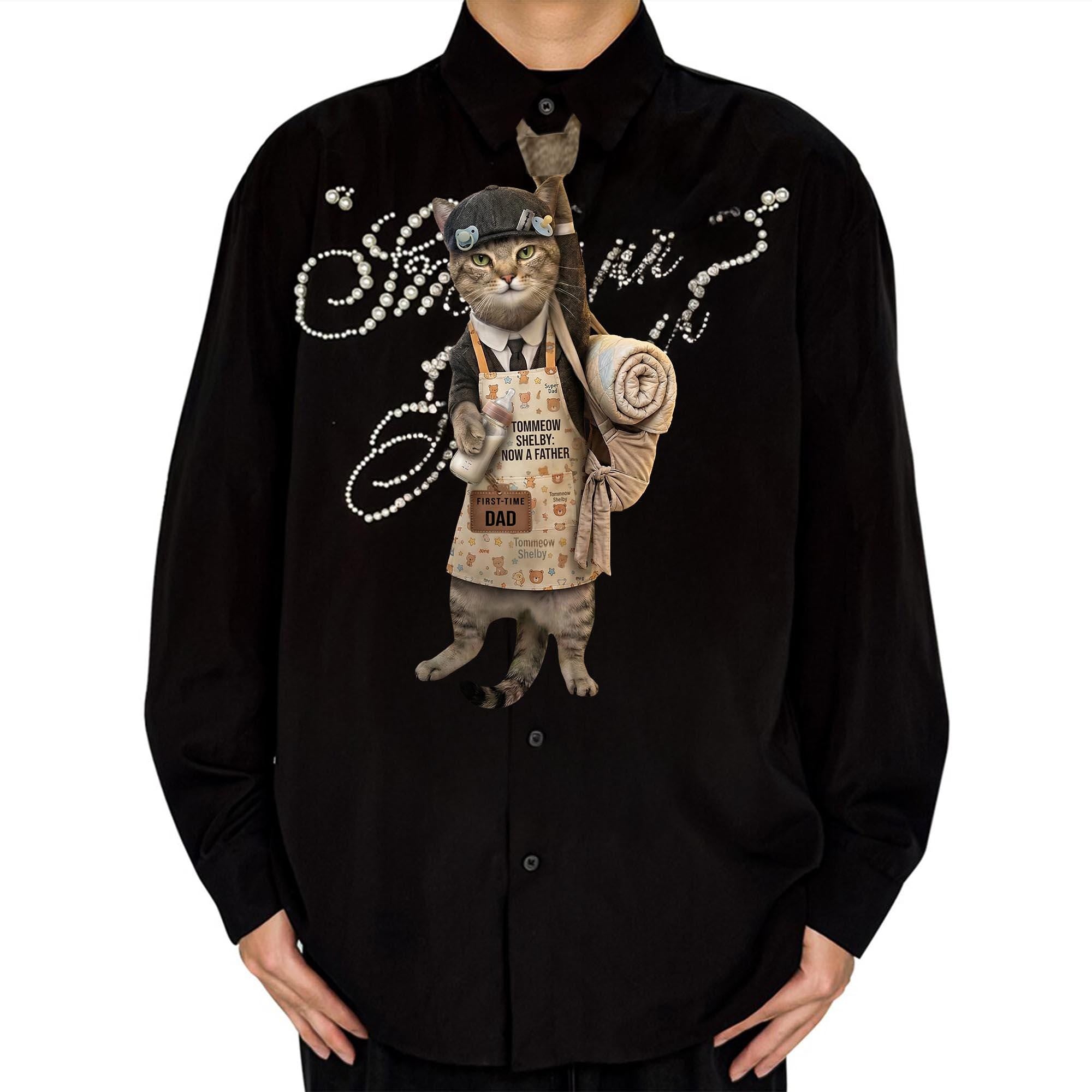 Novelty necktie featuring a tabby cat dressed as a first-time father, wearing an apron with a baby bottle and carrying a rolled blanket
