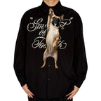 Novelty necktie featuring a realistic hanging French Bulldog design, a fun and unique fashion accessory.