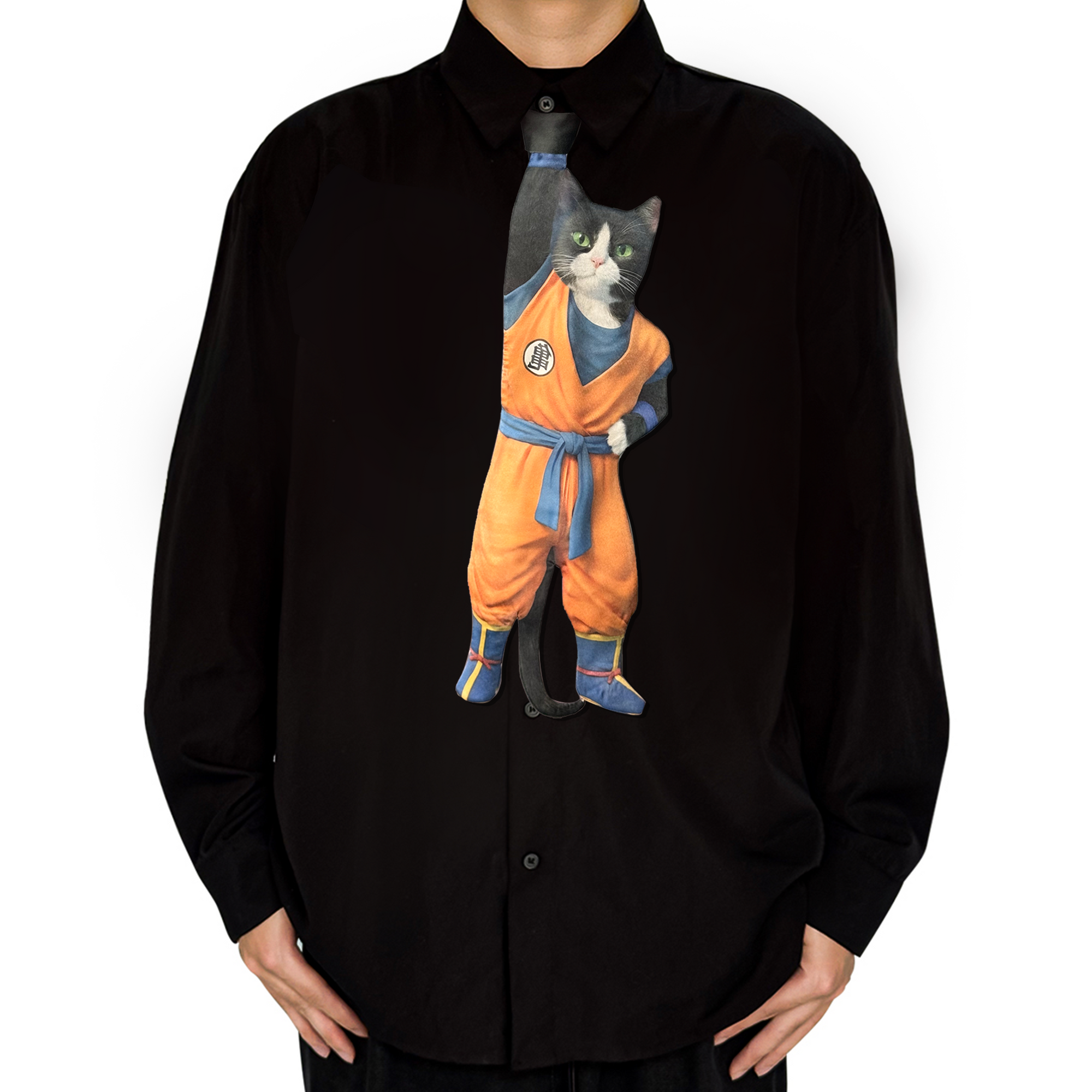 Novelty necktie featuring a creative illustration of a black and white tuxedo cat cosplaying as Goku from Dragon Ball, wearing the iconic orange gi with blue sash and boots. A unique and fun fashion accessory for anime fans.