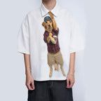 Novelty necktie featuring a Golden Retriever dog dressed in a plaid shirt, khaki shorts, and a cap, holding a drink, with a 'World's Best Dad' medallion around its neck