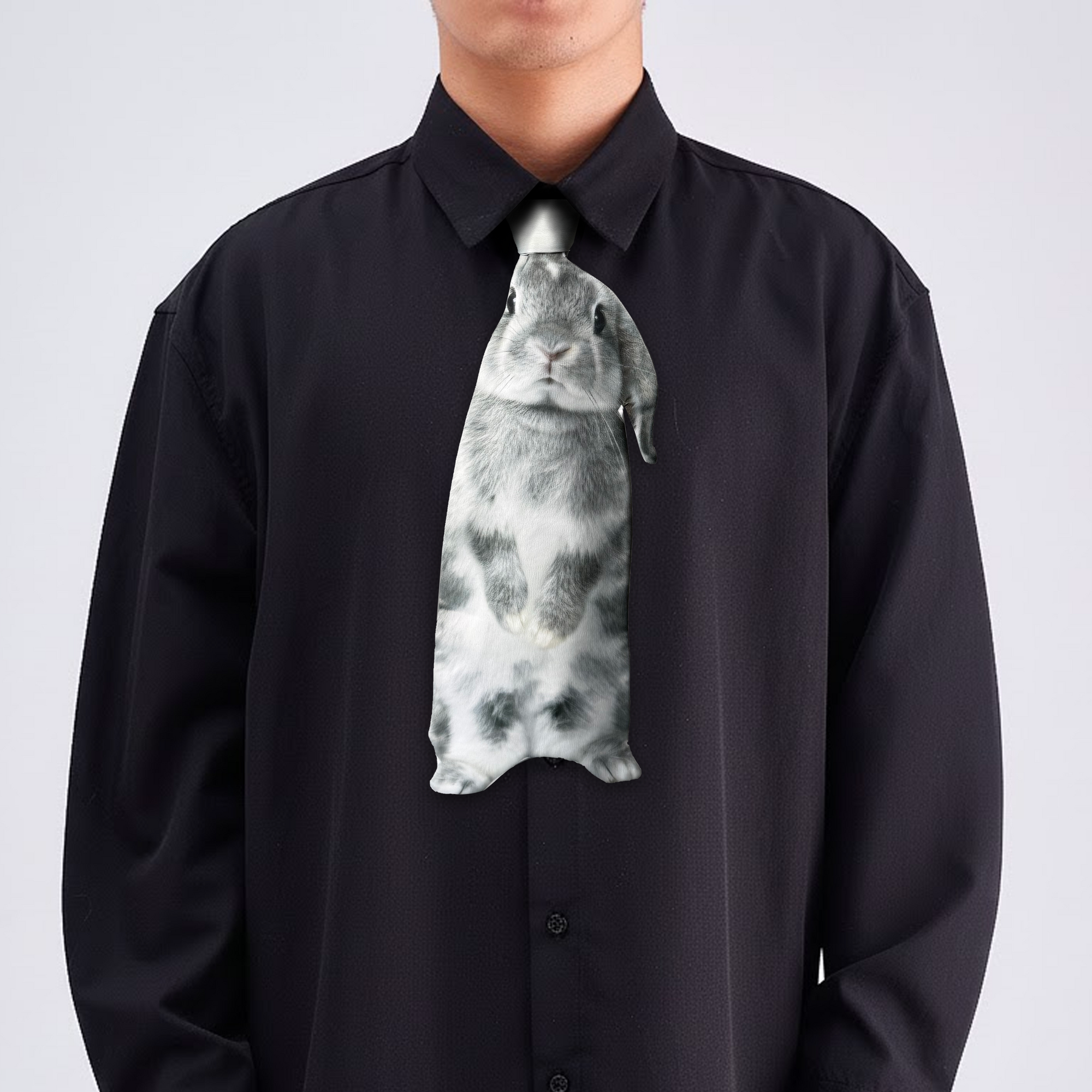 Novelty necktie featuring a realistic grey rabbit design, a fun and unique fashion accessory.