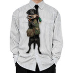 Novelty necktie featuring a black Labrador retriever dressed in a hunting vest, carrying a mallard duck in its mouth, appearing to hang from the wearer's collar