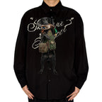 Novelty necktie featuring a black Labrador retriever dressed in a hunting vest, carrying a mallard duck in its mouth, appearing to hang from the wearer's collar