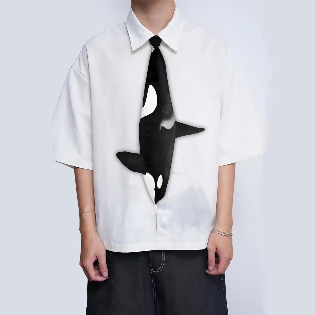 Unique novelty necktie featuring a sleek killer whale orca design.