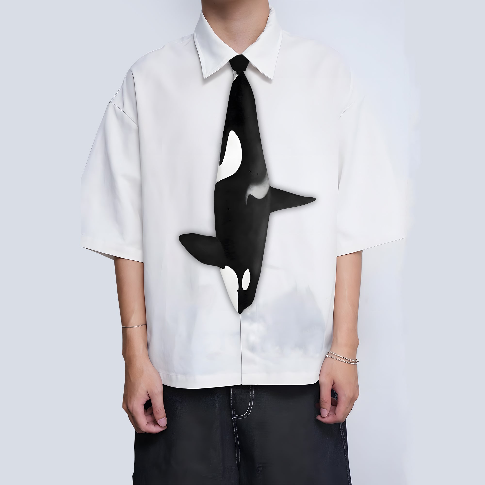 Unique novelty necktie featuring a sleek killer whale orca design.