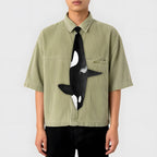 Unique novelty necktie featuring a sleek killer whale orca design.