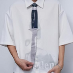 "Novelty necktie featuring a unique dagger design, a bold and edgy fashion accessory.