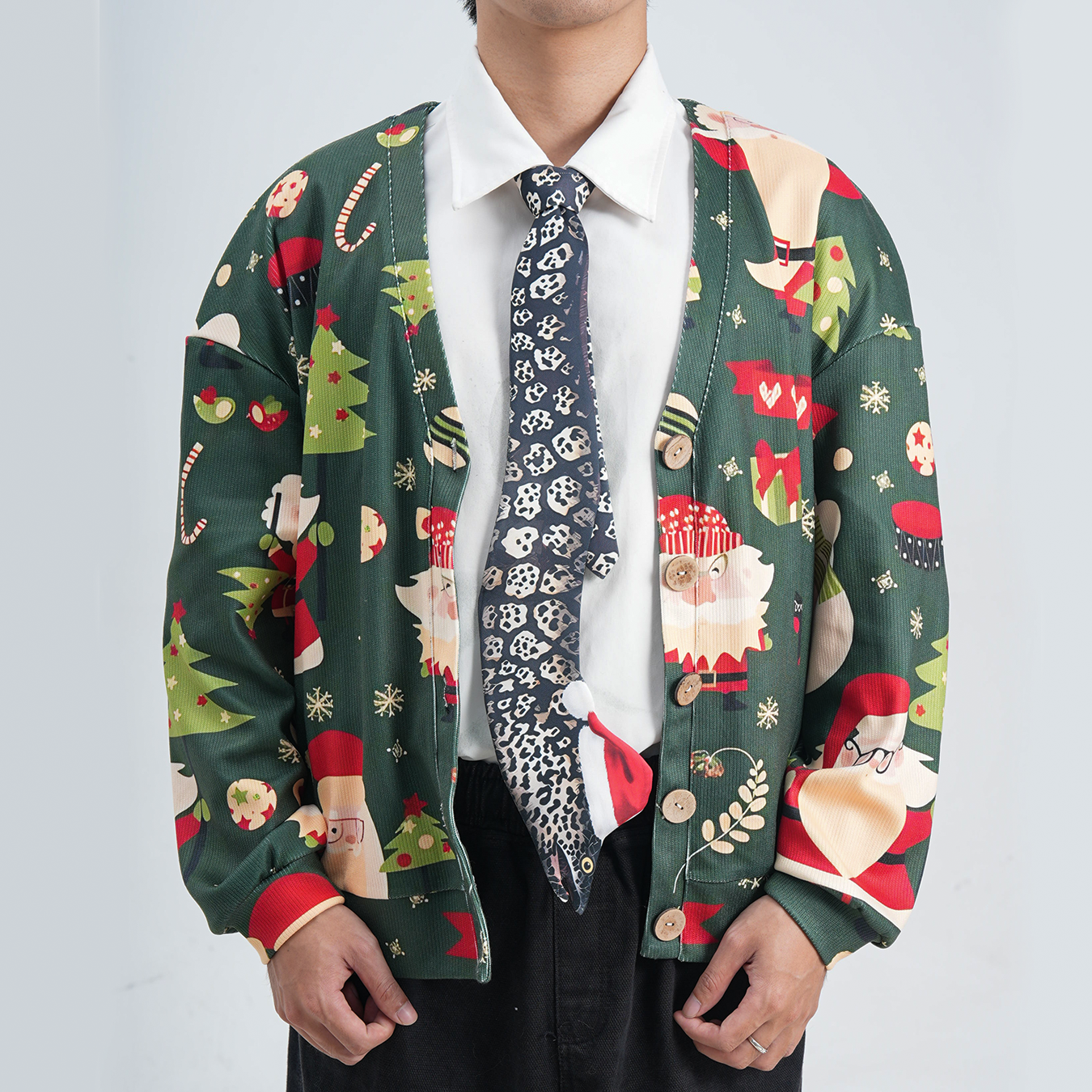 Eel-shaped novelty tie with a unique leopard print pattern and Santa hat, fun animal-themed festive accessory.