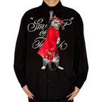 "Novelty necktie featuring a realistic hanging grey cat wearing a traditional red Vietnamese Ao Dai with floral patterns, a unique and festive fashion accessory."