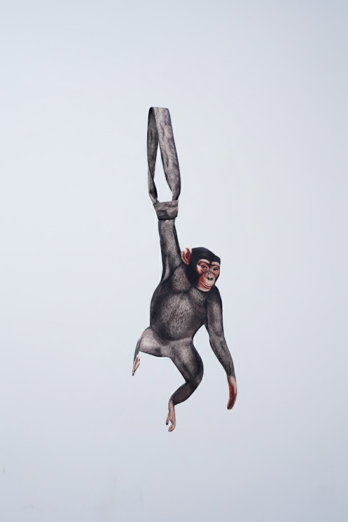 Unique novelty necktie featuring a realistic chimpanzee design, a fun and creative fashion accessory.